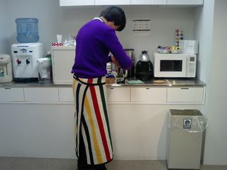 Taichi wearing a colorful skirt